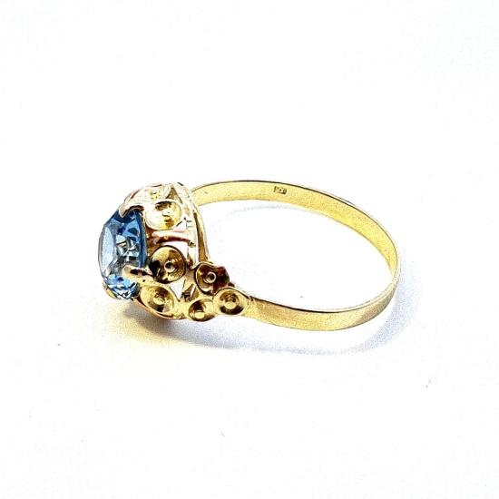 Zlatý prsten s modrým kamenem - topaz, vel. 70
