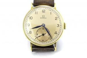 Zlaté hodinky OMEGA