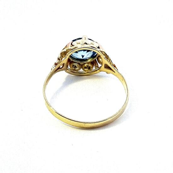 Zlatý prsten s modrým kamenem - topaz, vel. 70