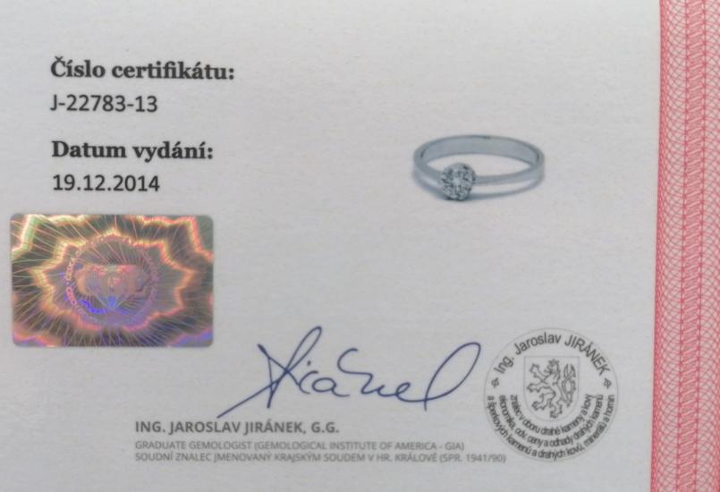 Zlatý prsten s briliantem 0,31 ct, vel. 58