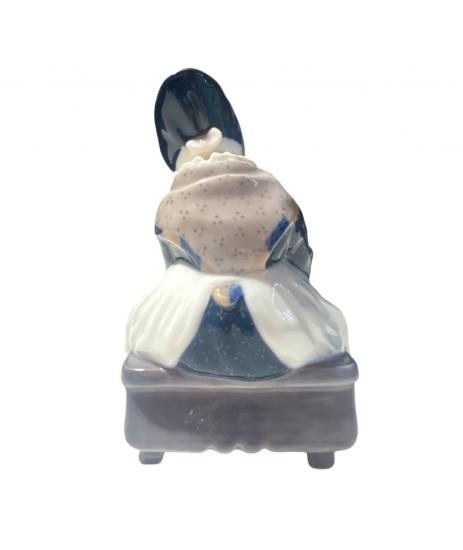 Vyšívající dívka