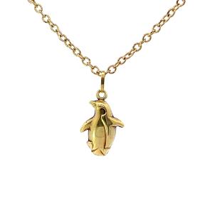 Zlatý přívěs, tučňák