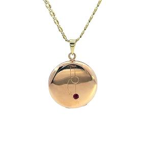 Zlatý medailon s rubínem